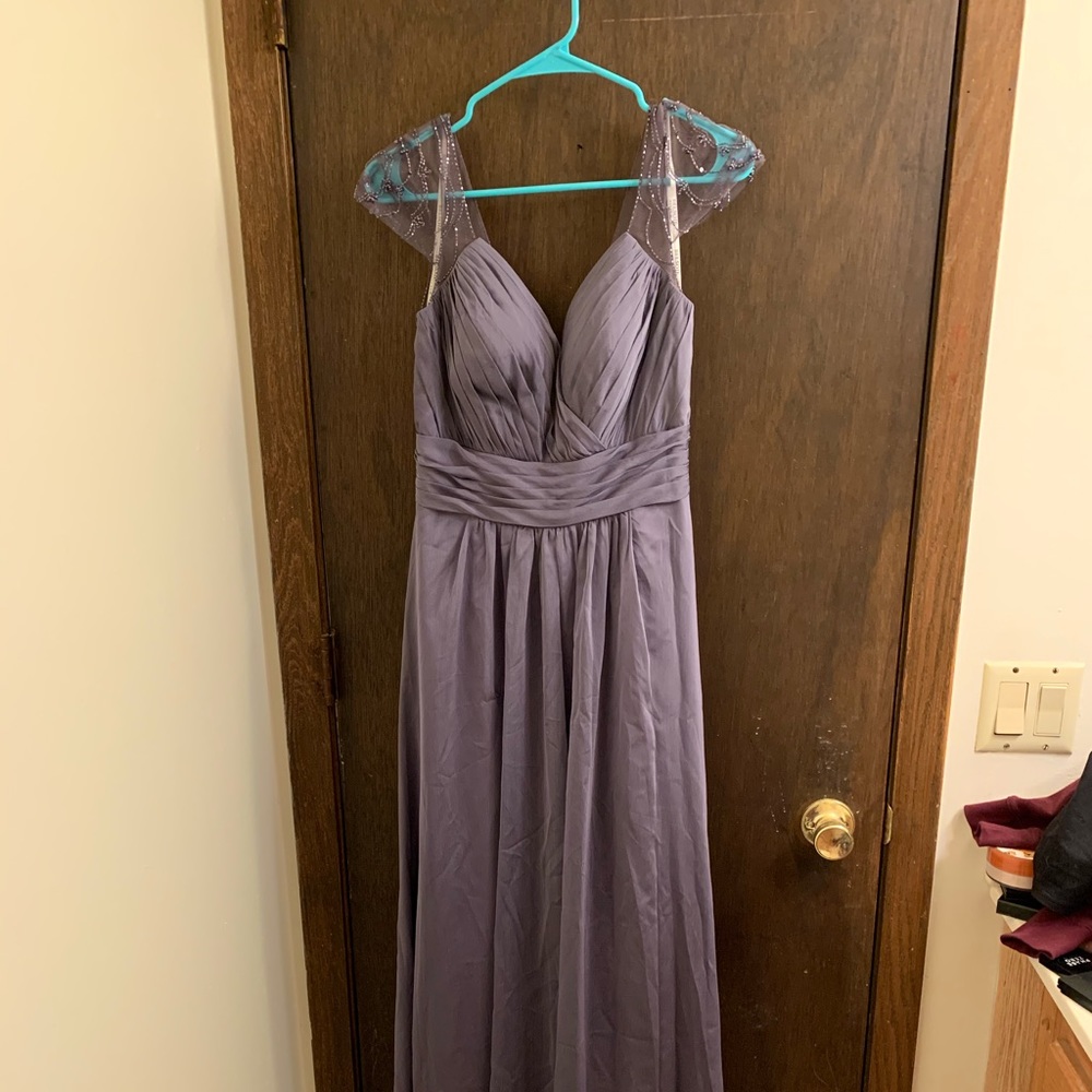 Stunning lavender gown with beading detail!